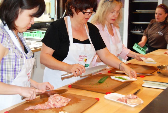 Group Effort - Prep Work in Paella Cooking Class at Ateliers & Saveurs