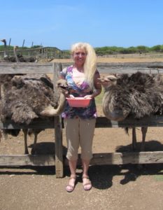 Patti Morrow Feeding the Birds at Curacao Ostrich Farm