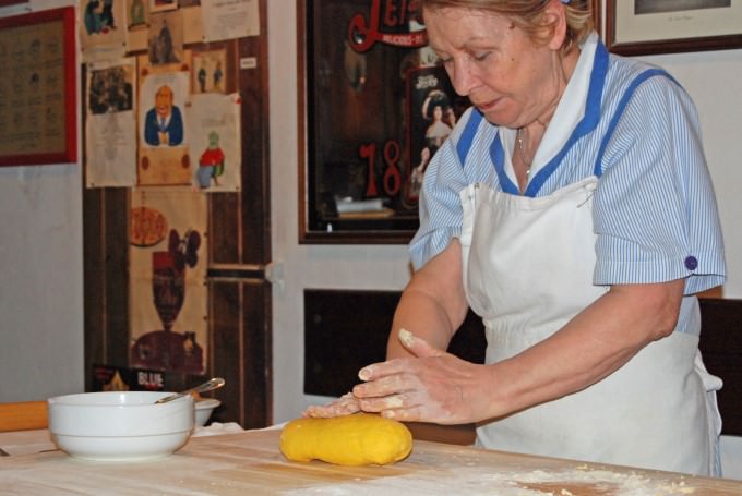 Luisa forms the pasta dough
