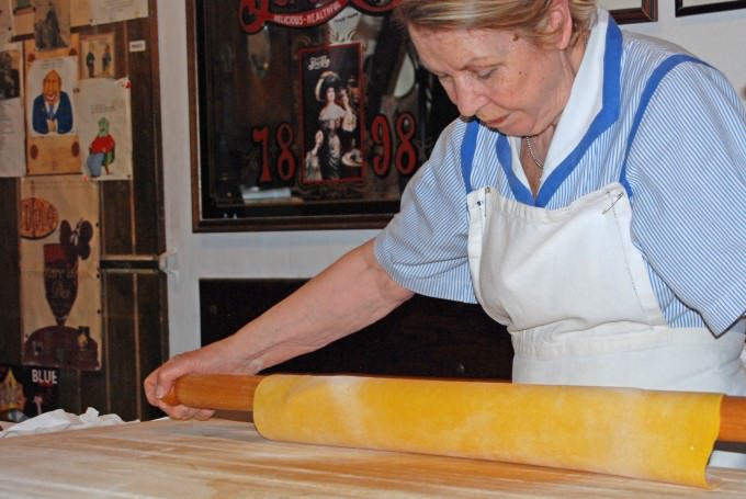 A special rolling pin is used to make perfect pasta