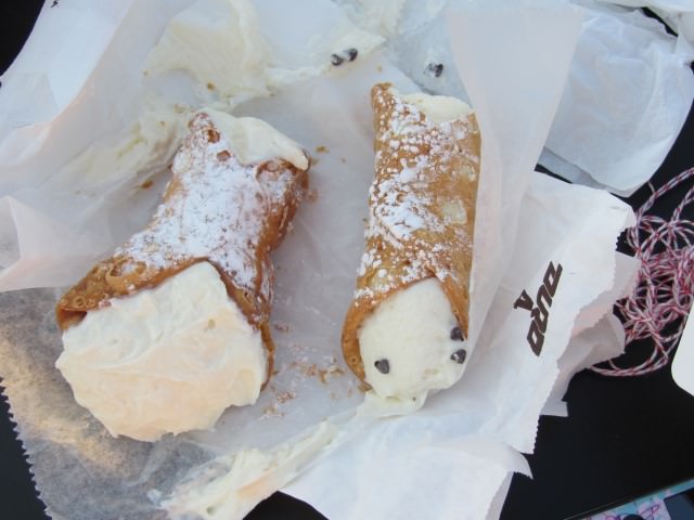 Cannoli from Mike's Pastry Shop (left) and Modern Pastry Shop (right) in Boston.