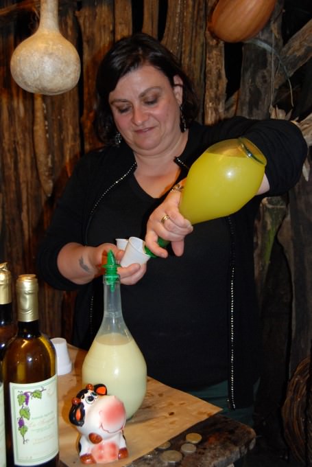 Rosa pours samples of limoncello at La Sorgente