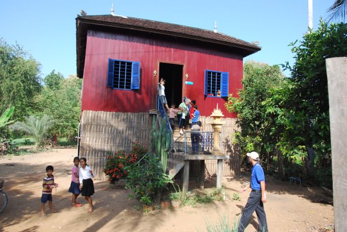 Visiting a local home near Wat Hanchey, Cambodia