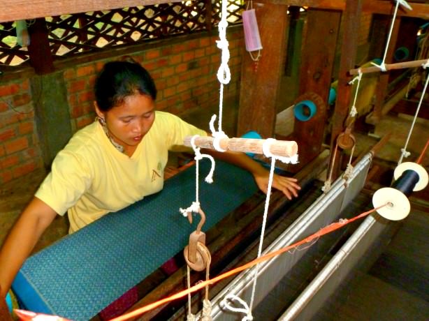 Woman Weaving Silk