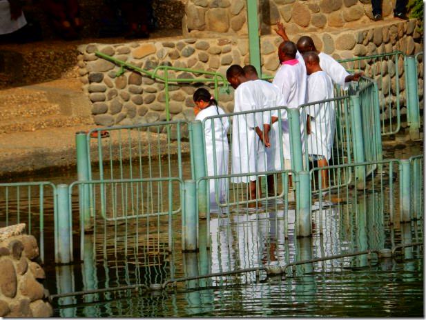 Pilgrims being baptized in the Jordan River