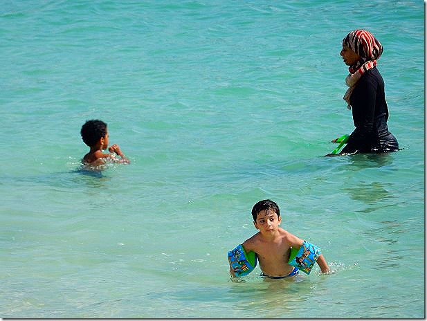 Women wear burkas to swim in Abu Dhabi
