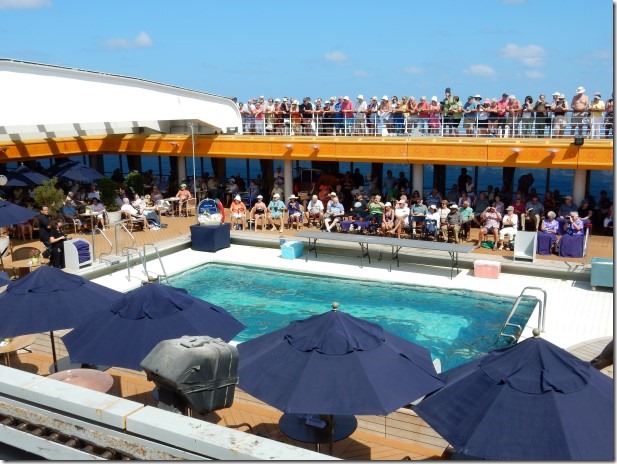 ms Rotterdam passengers watch King Neptune Ceremony