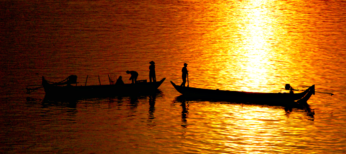 Fishermen on the Mekong River at Sunset 