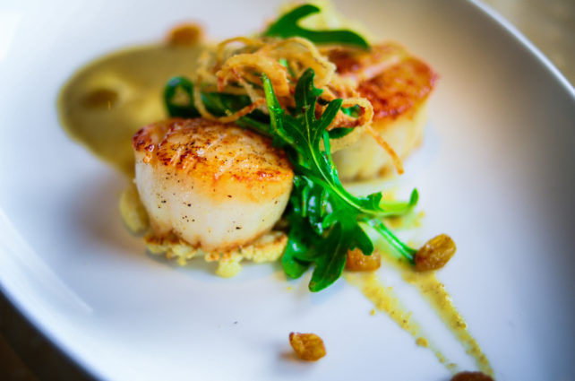 Start with Seared Scallops and a Golden Raisin Caper Sauce