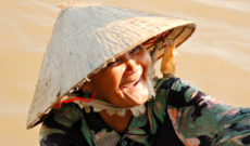 Woman on the Mekong River in Vietnam