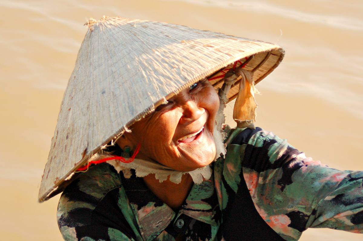 Woman on Mekong River in Vietnam