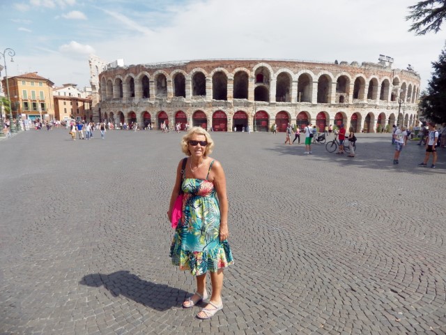 Diane in front of the Roman arena in Verona, Italy