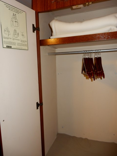 S.S. Legacy - Cabin closet with wooden hangers