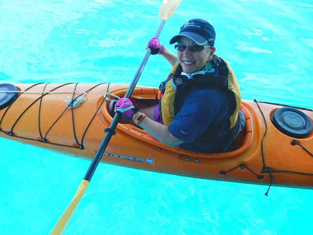 Jill Takes a Kayak for a Spin off the Aft Deck of Grande Mariner