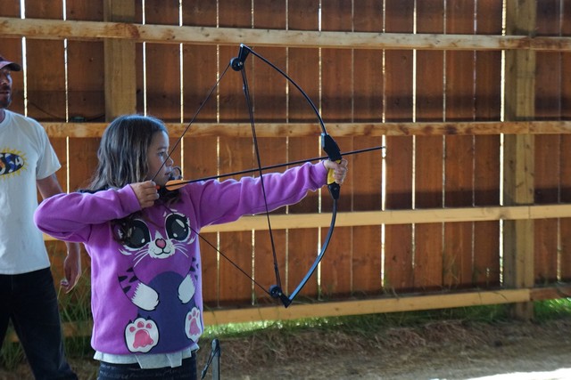 Jada Practices Archery at Echo Valley Ranch